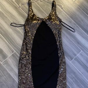 Black and gold sequined dress